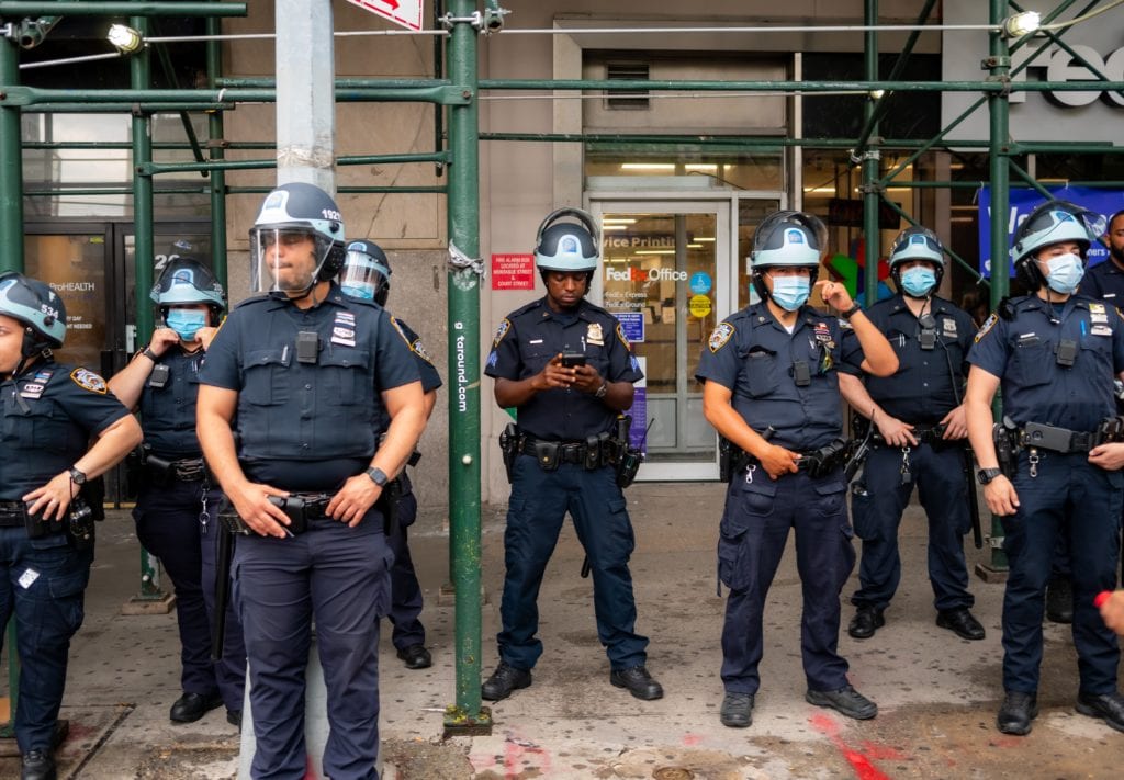 masked police standing together